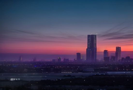 Photorealistic image of massive modern data center at dusk with high-tension power lines leading into it, financial district skyline in distant background, dramatic sky, realistic, 20 words.